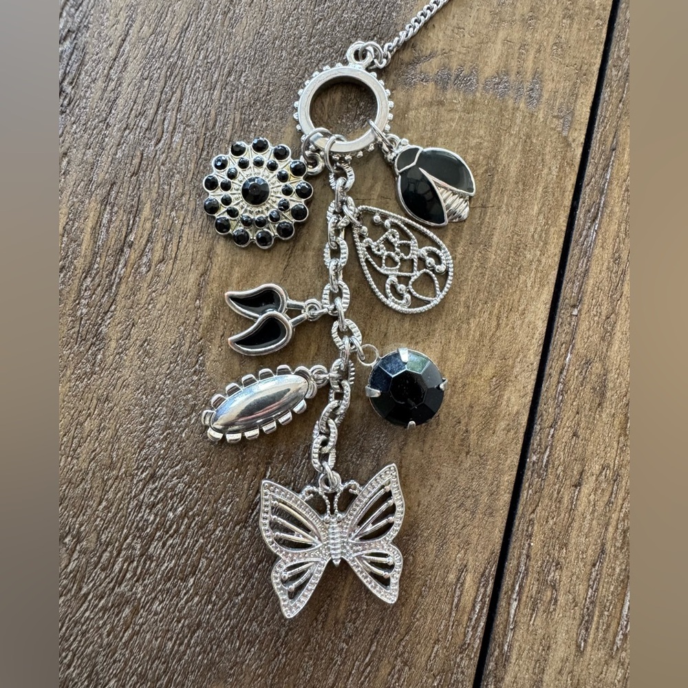 Silver Charm Toggle Necklace with Black Accents